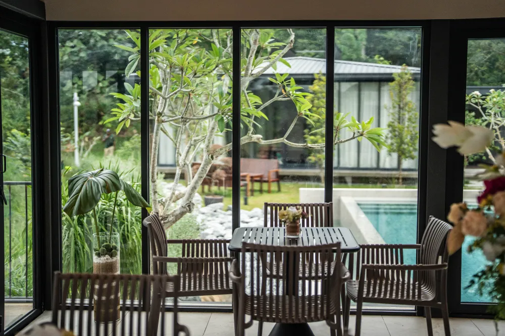 Indoor-outdoor lounge with garden views
