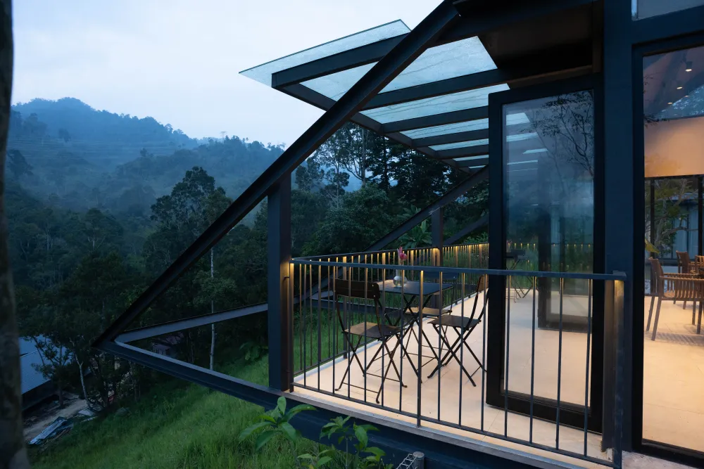 Glass corridor with mountain views