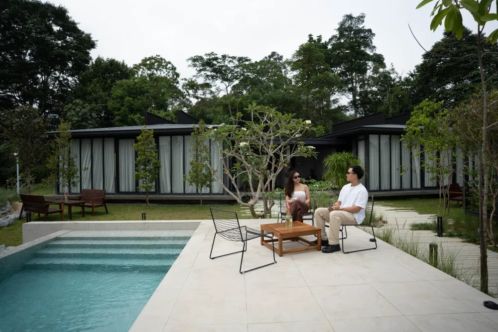 Guests relaxing by the pool